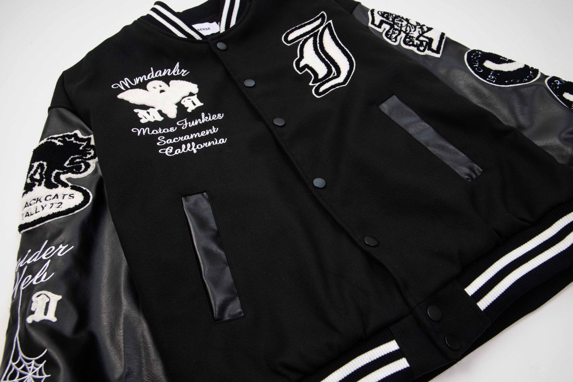 Geborduurd Varsity Jack