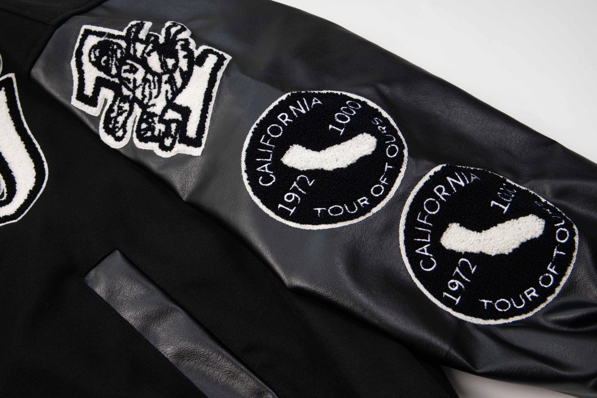 Geborduurd Varsity Jack