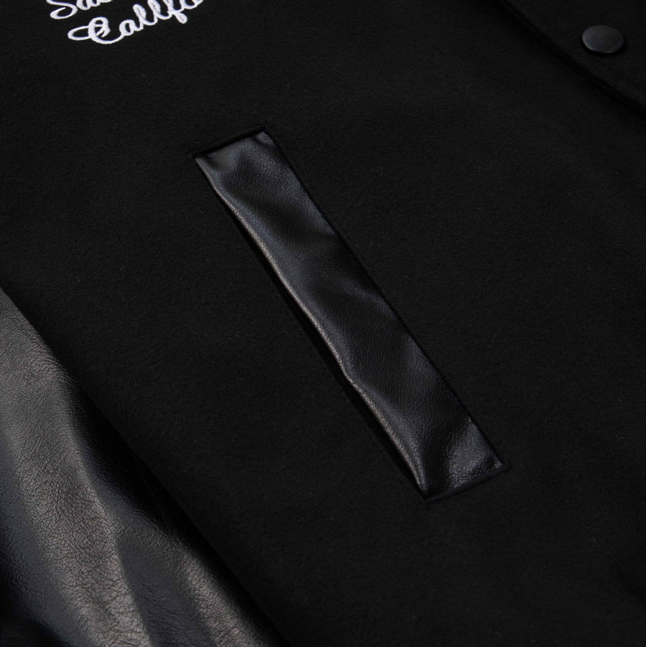 Geborduurd Varsity Jack