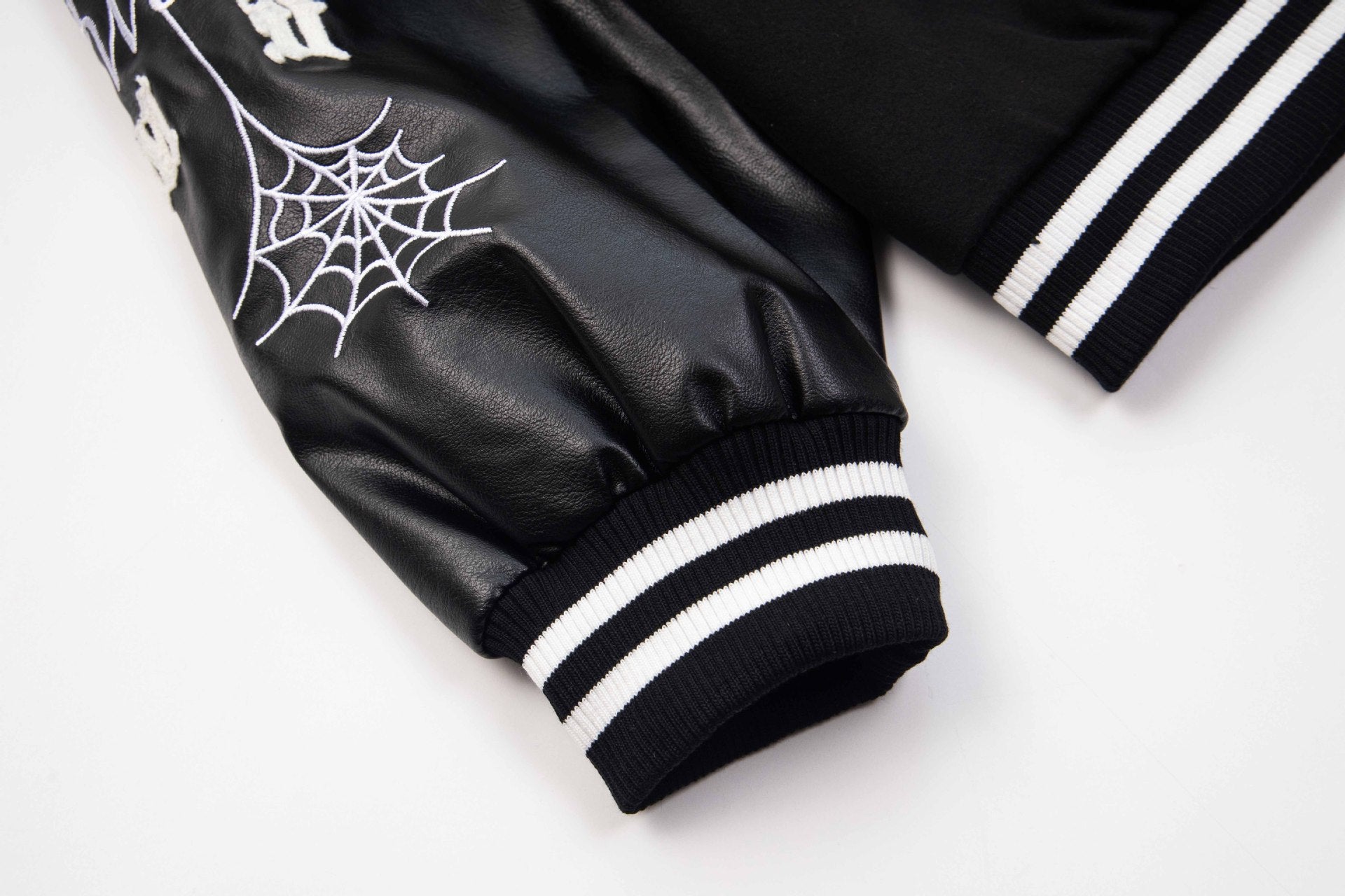 Geborduurd Varsity Jack